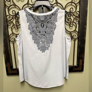 Knox Rose light blue sleeveless front pocket lace back detail top